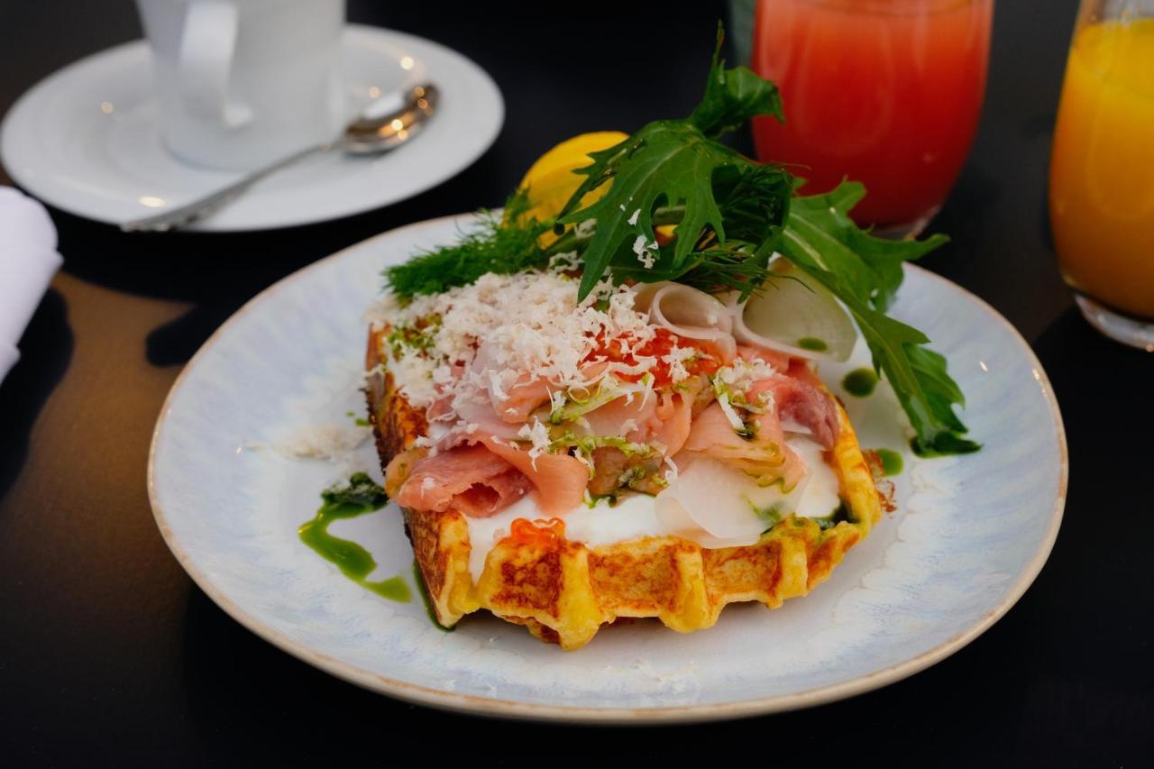 The Leo Grand Hotel Vienna Exterior photo A ham and cheese omelette